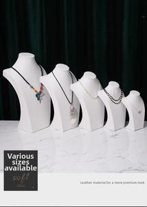 Detailed set of 5 white PU leather necklace display stands with tiered height design