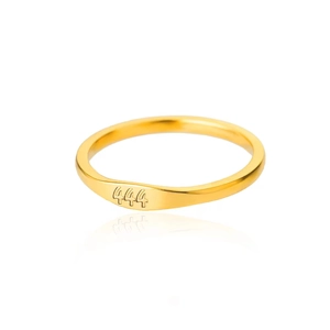 Macro shot of gold stainless steel ring featuring 444 engraving with a mirror reflection