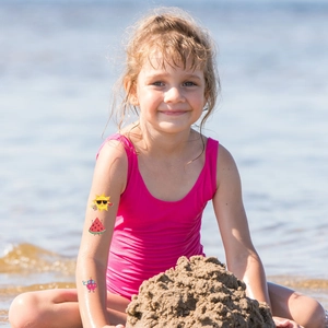 Waterproof glitter tattoo stickers for kids featuring cartoon sun and sea animals on beach