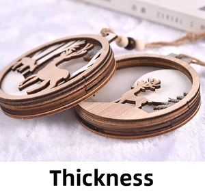 Close-up of laser-cut wooden Christmas deer ornament showing thickness and texture