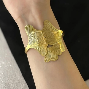 Elegant gold ginkgo leaf open bangle with detailed vein texture for women's minimalist style