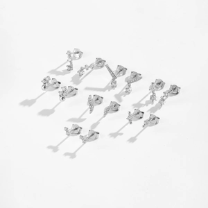 Macro shot of S925 sterling silver studs with small clear cubic zirconia geometric shapes