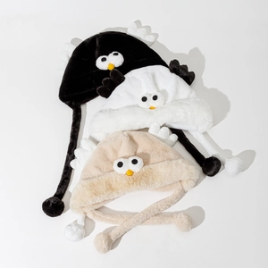 Three colors of cute cartoon bird plush hats with earflaps and wings for winter warmth