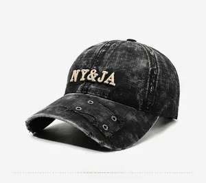 Vue latérale de casquette baseball vintage délavée avec broderie NY&JA et œillets en métal