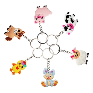 Cartoon farm animal keychain set featuring silicone pig cow rabbit and sheep designs