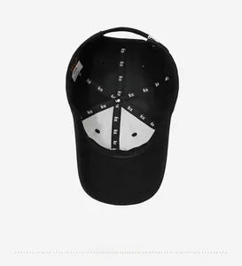 Detail view of black baseball cap interior with reinforced seams and branded tape