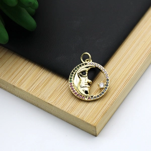 18K gold plated moon face pendant with colorful zircon stones in a detailed micro-set design
