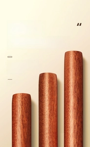 Macro detail of solid ebony rolling pin set showing natural wood grain and textures
