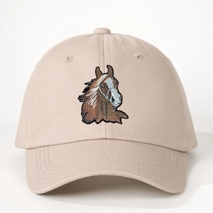 Classic beige cotton baseball cap featuring detailed brown horse head embroidery on the front