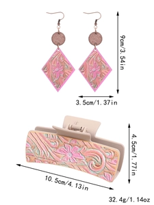 Detail view of pink sunflower leather hair claw and earrings with exact dimensions