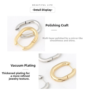 Detail of mirror polished U-shaped stainless steel earrings with vacuum plating finish