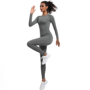 Set yoga grigio scuro senza cuciture con legging a vita alta per la corsa