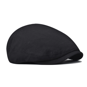 Side view detail of black retro flat cap showing durable fabric and precise curved stitching