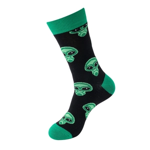 Detail of cotton crew socks featuring green alien embroidery and ribbed cuffs