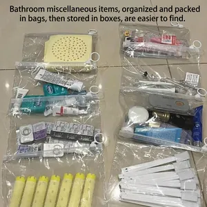 Transparent PVC storage pouch with zipper and ring handle for makeup and stationery