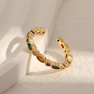 Elegant gold-plated crown ring with colorful marquise-shaped gemstones and beaded edges