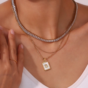 Luxury gold layered necklace set with sparkling cubic zirconia and letter B pendant