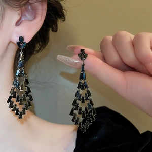 Elegant silver needle earrings with black zircon tassels in a luxury geometric design