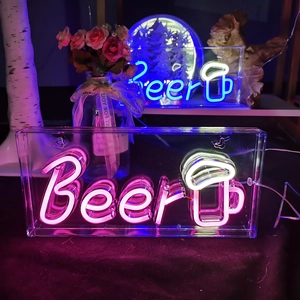 Neon Beer sign with pink and white lights for bar decor and party atmosphere