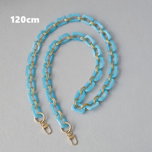 Detailed view of 120cm blue acrylic and gold metal chain strap with lobster clasps