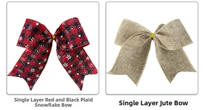Detail view of red black plaid snowflake bow and natural linen bow with gold tie