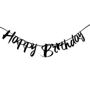 Close-up of black Happy Birthday cursive banner with string for party decorations