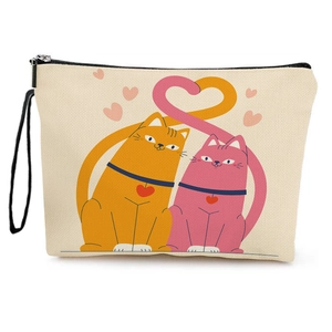 Canvas makeup bag with cartoon cats and heart print featuring black zipper and wristlet