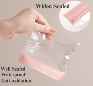 Thickened transparent jewelry pouch with pink seal showing waterproof leakproof performance