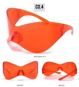 Three-view display of orange oversized Y2K wrap-around sunglasses from multiple angles