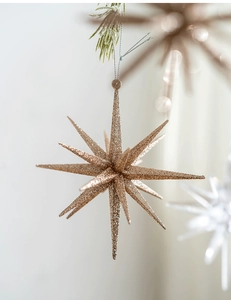 Elegant champagne gold glitter burst star Christmas tree ornament with fine texture