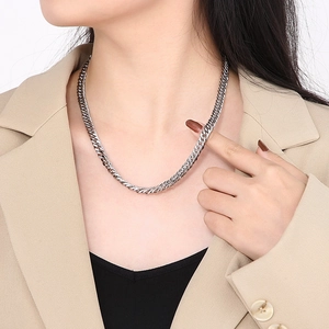 Hip hop silver curb chain necklace in stainless steel shown on male model neck