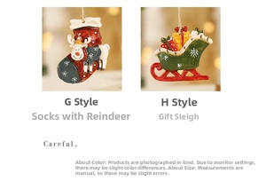 Detailed view of resin Christmas ornaments featuring reindeer sock and gift sled designs