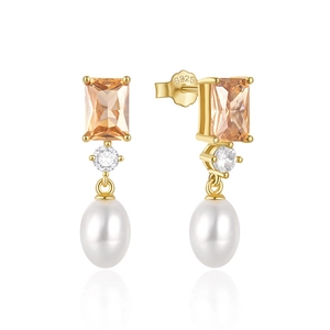 Detail showing S925 silver base with champagne gems and teardrop pearl on gold earring