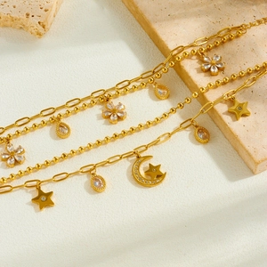 Double-layered gold-plated stainless steel chain with star, moon and flower charms