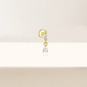 Macro detail of S925 sterling silver water drop earring with sparkling zircon stones