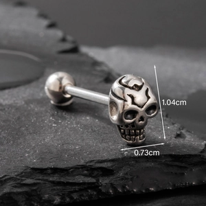 Polished stainless steel skull tongue ring with 1.04cm height and 0.73cm width dimensions
