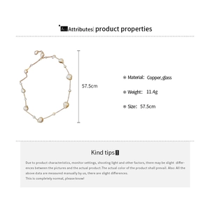 Detail view of pearl beaded necklace with copper chain, showing 11.4g weight and 57.5cm size
