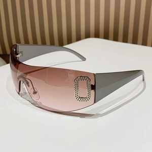 Chic Y2K frameless oversized sunglasses with gradient pink lenses and rhinestone detail