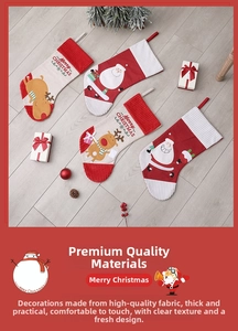 Macro shot of embroidered Santa Claus and reindeer on corduroy Christmas stockings