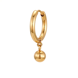 Macro detail of golden stainless steel hoop earring with sphere pendant and polished finish