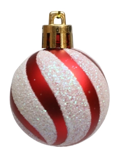 Close-up of red and white spiral Christmas ball with glitter and gold hanging loop