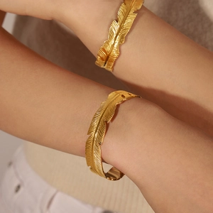 Gold plated titanium steel feather open bangle with realistic textured details for women