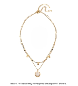Detail view of gold layered necklace with marble round pendant and natural stone accents