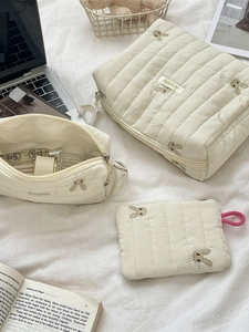 Quilted beige storage bag set with rabbit embroidery and soft cotton texture