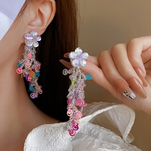 Y2K iridescent flower earrings with colorful smiley face beads and long tiered tassels