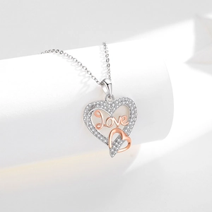 Elegant S925 sterling silver heart necklace with Love engraving and sparkling diamonds