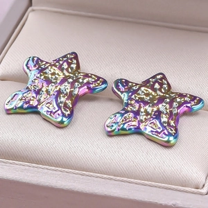 Macro shot of 304 stainless steel star earrings with iridescent rainbow electroplated finish