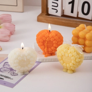 Romantic heart shaped rose scented candle in white and orange for home decor