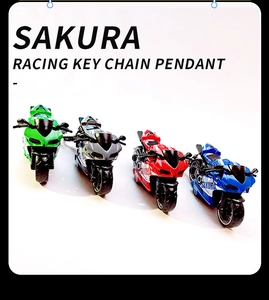 Racing keychain pendants in green, silver, red, and blue motorcycle model designs