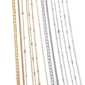 Various gold and silver stainless steel chains including curb, box, and bead styles